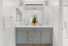 Primary bathroom with dual vanity sinks