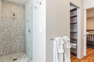 Ensuite bath has walk-in shower and walk-in c
