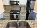 Granite countertops, stainless appliances