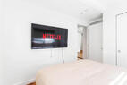 Relax in bed with mounted Smart TVs