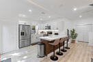kitchen. Washer & Dryer in left cabinet