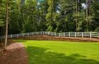 flat backyard with view of the water