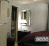 Open wall closet to the left