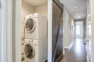 Maytag washer/dryer adjacent to bedrooms