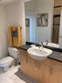 Bathroom with walk in closet