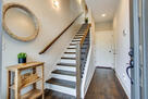Staircase with wooden steps and handrail for 