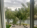 View of the river and fly fisherman