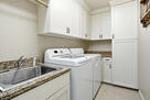 Convenient laundry with extra storage.