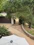 View from deck looking down on umbrella table