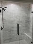 Oversized shower with bench, frameless glass