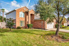 Front of the house with driveway up to 4 cars