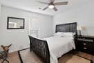 Queen bed in bedroom 2.