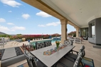 Covered lanai with dining and firepit