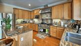 The kitchen is fully equipped with stainless
