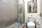 Gen Suite Bath Stylish Grey tile , modern art