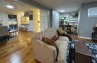 Living area, breakfast nook, and dining room