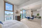 loft bedroom opens to dining area