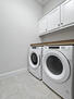 Laundry room with built-in shelf