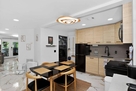 Kitchen overview w/ utility room view