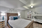 Queen bed with bunk beds