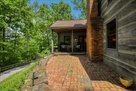 Side porch with rocking chairs.