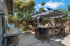 Large outdoor barbque and patio bar seating w