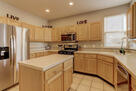 Kitchen with Island and Gas Range