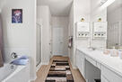 Master bathroom with shower and tub