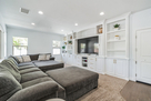 Spacious Family Room with Large Sofa and 82" 