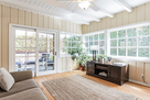 Bright sunroom over looks large private backy