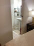 Bathroom with king bed. Walk in shower