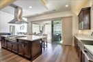 2 large doors open to outside patio with brea