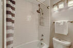 Modern tiled tub surround for a relaxing bath
