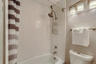 Modern tiled tub surround for a relaxing bath