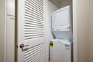 In-home laundry and hallway storage