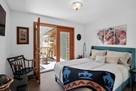 Small bedroom with direct south-deck access