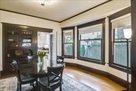 Dining room has garden view to climbing roses