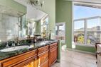 Master bath double sinks views to right.