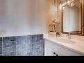 Main level half bath with quartz counter and