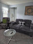 Cozy living room with recliner and sofa