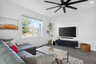Living Room With Pond View and Smart TV