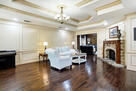 Bright, open living space with fireplace.