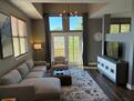 Living room has 55 inch flat screet TV
