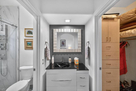 Royal Suite vanity area between walk in close