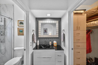 Royal Suite vanity area between walk in close