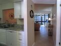 Entrance to the condo with the kitchen front
