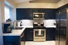 Renovated kitchen with new tiles.