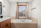 Primary king ensuite whirlpool bath