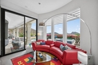 Bay window seating ad access to covered lanai