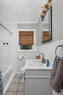 Main floor bath includes tub/shower